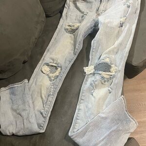 Distressed Light Blue Jeans